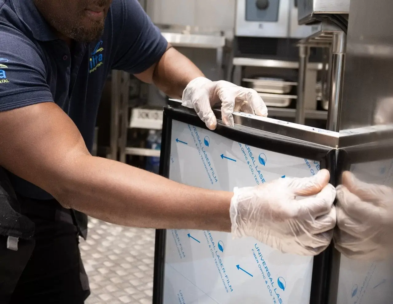 Replacement fridge seal being fitted